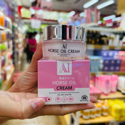 Hand holding AI Horse Oil Cream box in store