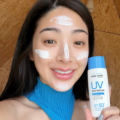 Applying Clear Nose UV Sun Serum SPF50+ PA++++