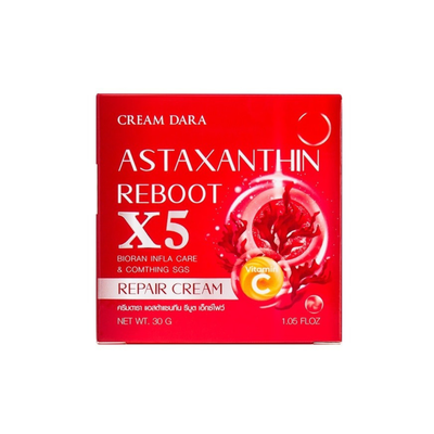 Applying Astaxanthin Reboot Cream on face
