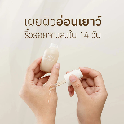 Woman applying EVE'S placenta serum on face