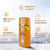 A bottle of Faris by Naris Perfect Sun Protection Lotion with SPF50/PA+++ label, indicating the product is a sunscreen lotion with a high SPF rating, visible in a bright orange packaging with a cityscape background.