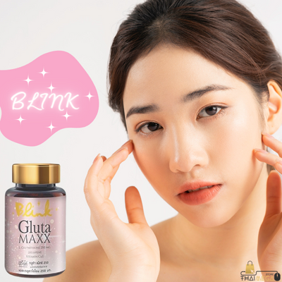 A woman smiling and holding a bottle of Blink Gluta Max